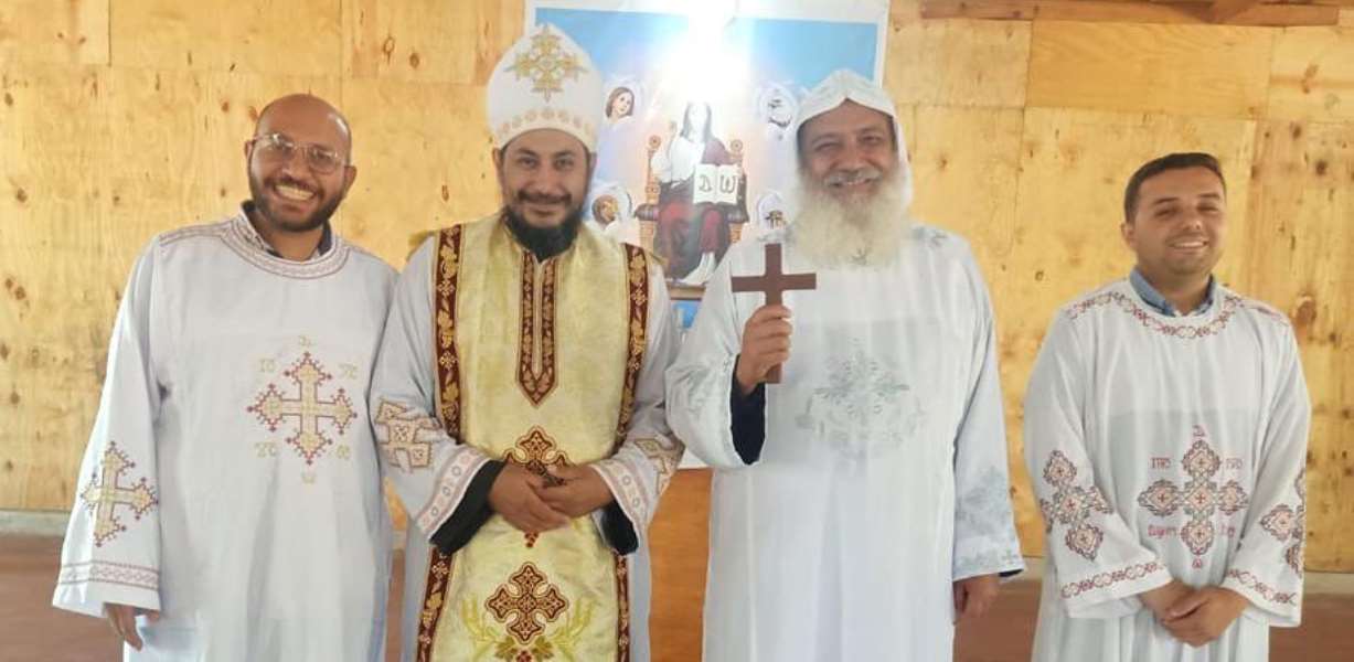 His Grace Bishop Joseph, Father Bishoy Wasfi, and church deacons.